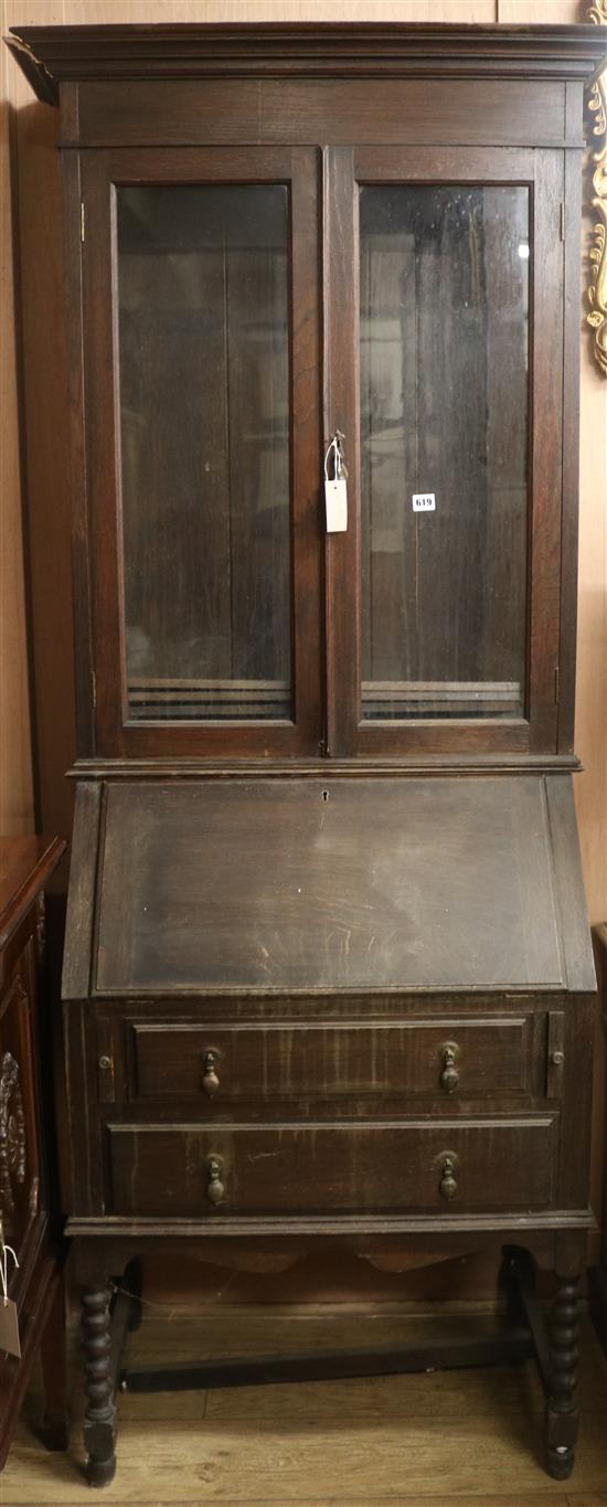 A 1920s oak bureau bookcase, H.207cm